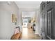 Inviting foyer features wood floors, neutral walls, and a view into the open-concept living area at 199 Pretty Run Branch Lane, Wendell, NC 27591