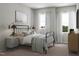 Relaxing bedroom features a wrought iron bed frame, two windows, and a nightstand with a vintage-style lamp at 2007 Trident Maple Ln, Chapel Hill, NC 27517