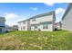 A spacious backyard featuring a grassy lawn and well-maintained landscaping, perfect for outdoor enjoyment at 2177 Campbell, Burlington, NC 27215