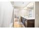 Bathroom featuring a double sink vanity and a shower with curtain at 2177 Campbell, Burlington, NC 27215