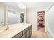 Bathroom featuring a double sink vanity and a separate walk-in closet at 2177 Campbell, Burlington, NC 27215