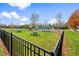 Community playground featuring picnic tables, benches, volleyball and ample green space for various activities at 2177 Campbell, Burlington, NC 27215