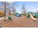 Community playground with slides, swings, and play equipment at 2177 Campbell, Burlington, NC 27215
