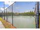 Outdoor community tennis court surrounded by a secure fence for hours of neighborhood fun and exercise at 2177 Campbell, Burlington, NC 27215