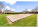 Outdoor sand volleyball court and manicured lawn in a community at 2177 Campbell, Burlington, NC 27215