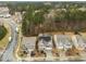 Aerial view of the homes in the neighborhood with tree lined streets at 2310 Gilman St, Durham, NC 27703