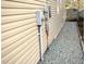 Exterior view of the house showing electrical panels at 2310 Gilman St, Durham, NC 27703
