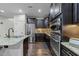A well-equipped kitchen with stainless steel appliances and granite countertops at 2310 Gilman St, Durham, NC 27703