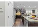 Spacious kitchen with stainless steel appliances, hardwood floors, and an island sink at 2310 Gilman St, Durham, NC 27703