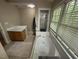 Bathroom featuring a soaking tub with jets, and a glass shower at 27 Creeks Edge Ct, Durham, NC 27713