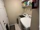 Functional laundry room with modern washer and dryer and ample storage space at 27 Creeks Edge Ct, Durham, NC 27713
