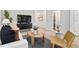 Bright and airy living room showcasing modern decor, wood flooring and a relaxing ambiance at 2836 Egert Dr, Haw River, NC 27258