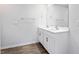 Bathroom with double sink vanity, white cabinets and modern fixtures at 2838 Egert Dr, Haw River, NC 27258