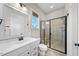 Bathroom featuring a glass shower and sink with white cabinets at 3 Alumwood Pl, Durham, NC 27705
