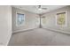 Spacious bedroom with three large windows providing lots of natural light at 3 Alumwood Pl, Durham, NC 27705