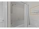 Clean bathroom features a bathtub and shower combo with white subway tile surround at 3111 Coachmans Way, Durham, NC 27705