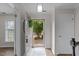 Bright entryway with hardwood floors, adjacent rooms and natural light at 3111 Coachmans Way, Durham, NC 27705