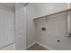 A spacious closet with a rod for hanging clothes and a nearby doorway at 3111 Coachmans Way, Durham, NC 27705