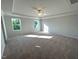 Spacious bedroom featuring a trey ceiling, carpet, and natural light at 35 Calabria Ct, Franklinton, NC 27525
