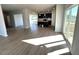 Open-concept living area adjacent to the kitchen with sliding glass doors leading to a deck at 35 Calabria Ct, Franklinton, NC 27525