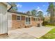 Brick home features a patio ideal for outdoor living and entertaining at 3910 Hillgrand Dr, Durham, NC 27705
