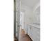 Bathroom features modern vanity, marble countertops, and neutral-toned walls and accents at 3910 Hillgrand Dr, Durham, NC 27705