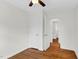 Light-filled bedroom offers white walls, hardwood floors, and easy access to other rooms at 3910 Hillgrand Dr, Durham, NC 27705