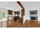 Open floor plan with hardwood floors leading to the kitchen and living room at 3910 Hillgrand Dr, Durham, NC 27705
