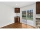 Charming eat-in kitchen nook with granite counter and view of the back yard at 3910 Hillgrand Dr, Durham, NC 27705