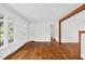 Open living area featuring hardwood floors, entryways, and a window with a view at 3910 Hillgrand Dr, Durham, NC 27705