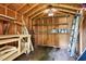 Inside the storage shed, featuring shelving, tools, and ample storage space at 3910 Hillgrand Dr, Durham, NC 27705
