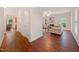 Open-concept design showing the living room with fireplace and views from the foyer at 4070 Landover Ln, Raleigh, NC 27616