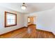 Bright dining room with gleaming hardwood floors, natural light, and arched doorway at 412 Suburb St, Rocky Mount, NC 27801