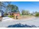 Inviting single-story brick home with a lush front lawn and a freshly paved driveway at 412 Suburb St, Rocky Mount, NC 27801