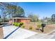 Charming single-story brick home featuring a well-maintained lawn and a classic mailbox at 412 Suburb St, Rocky Mount, NC 27801