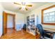 Office space with hardwood floors, fan, window and built-in shelving for ample storage space at 412 Suburb St, Rocky Mount, NC 27801