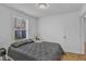 Bedroom features a window with blinds and neutral paint at 43 Nordan St, Angier, NC 27501