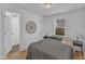 Cozy bedroom with wood floors, closet, and bright natural light at 43 Nordan St, Angier, NC 27501