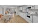Bright and inviting kitchen featuring modern appliances and a seamless transition to the dining and living areas at 43 Nordan St, Angier, NC 27501