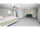 Spacious bedroom features neutral carpet and ensuite bath at 4324 Old Lewis Farm Rd, Raleigh, NC 27604