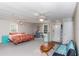 Spacious bedroom with ensuite bath, ceiling fans, and neutral carpet at 4324 Old Lewis Farm Rd, Raleigh, NC 27604