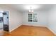 Dining area featuring hardwood floors and natural lighting at 4324 Old Lewis Farm Rd, Raleigh, NC 27604
