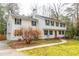 Charming two-story home featuring a well-manicured lawn and attached garage, perfect for families at 4324 Old Lewis Farm Rd, Raleigh, NC 27604