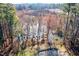 Overhead shot of a marshy landscape with trees in their autumn colors, offering a natural and beautiful view at 4324 Old Lewis Farm Rd, Raleigh, NC 27604