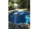 View of an in-ground pool highlighting the refreshing water and recreational space for summer enjoyment at 4324 Old Lewis Farm Rd, Raleigh, NC 27604