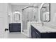 Spa-like bathroom featuring sleek fixtures, glass-enclosed shower, and modern finishes at 4721 Cypress Ford Dr, Fuquay Varina, NC 27526