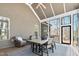 Covered porch has seating and a dining table at 4721 Cypress Ford Dr, Fuquay Varina, NC 27526