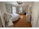 Comfortable bedroom with hardwood floors, natural light, and ample space, ideal for a serene and restful atmosphere at 501 North St, Chapel Hill, NC 27514