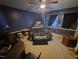 Bedroom featuring a ceiling fan, natural light and hardwood floors at 512 Monroe Holt Rd, Graham, NC 27253