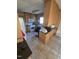 Traditional kitchen with wood cabinetry, appliances, and ample counter space for cooking and storage at 512 Monroe Holt Rd, Graham, NC 27253